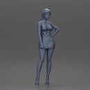 Woman in silver mini dress posing with hand on hip - Only-Games