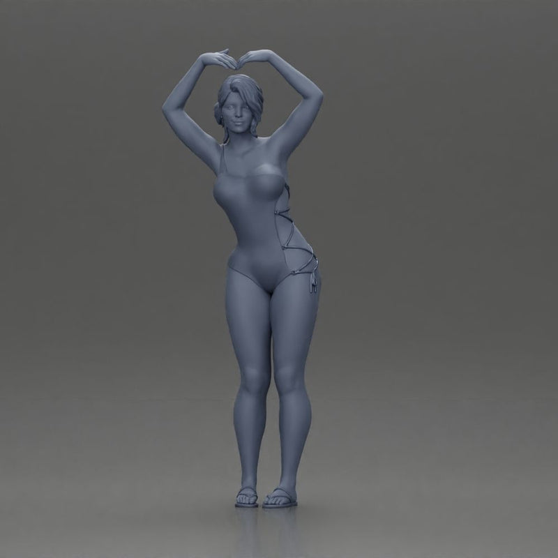 Brunette woman in turquoise swimsuit stretching with elegant ballet pose - Only-Games