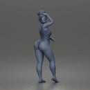 Standing woman shields eyes wearing swimsuit sunglasses earrings flip flops