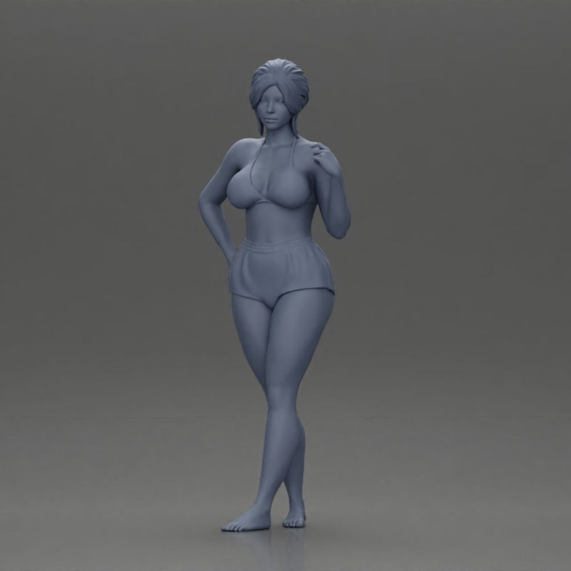 woman posing barefoot wearing bikini top and shorts stylishly - Only-Games