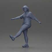 Woman in casual outfit joyfully kicks her leg with energy - Only-Games