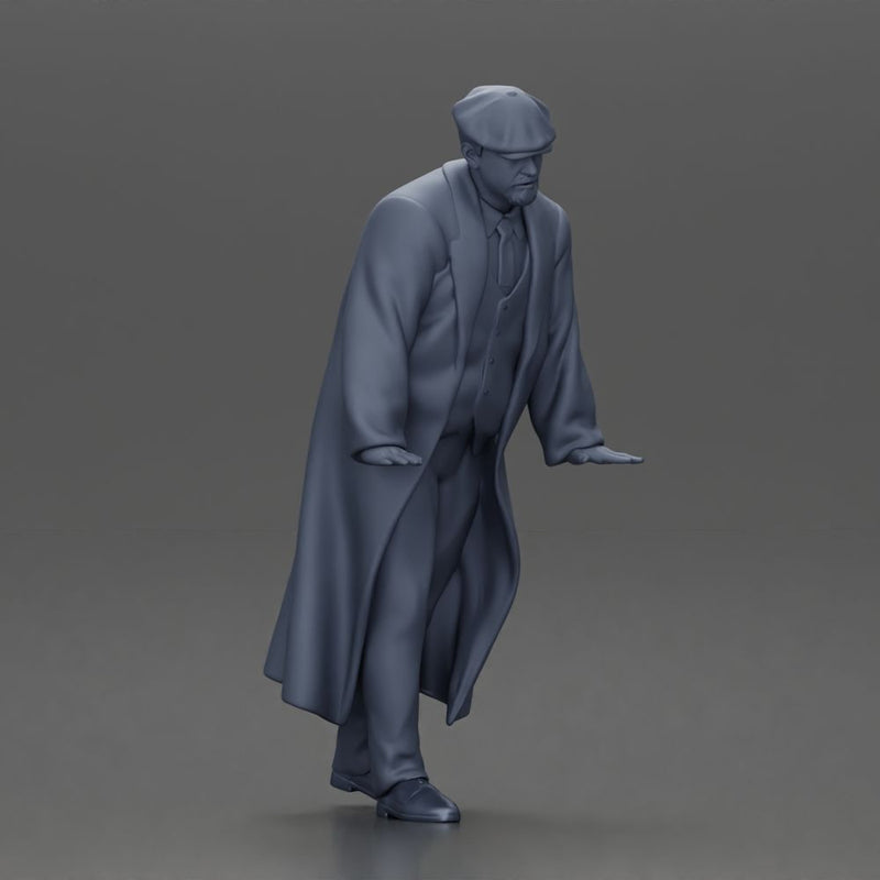 Man in black coat wearing flat cap standing with serious expression - Only-Games