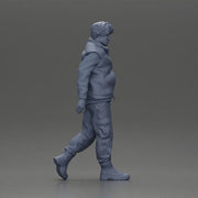 bearded man walking wearing red vest black sweater gray pants black boots - Only-Games