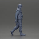 bearded man walking wearing red vest black sweater gray pants black boots - Only-Games