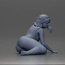 attractive woman in red swimsuit resting calmly on the beach - Only-Games