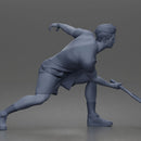 Focused Tennis Player Lunging Forward in Athletic Shirt, Shorts, and Sneakers