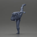 Ninja in black uniform performs high side kick with precision - Only-Games