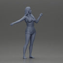 woman wearing a wet shirt moving gracefully with her arms in motion - Only-Games