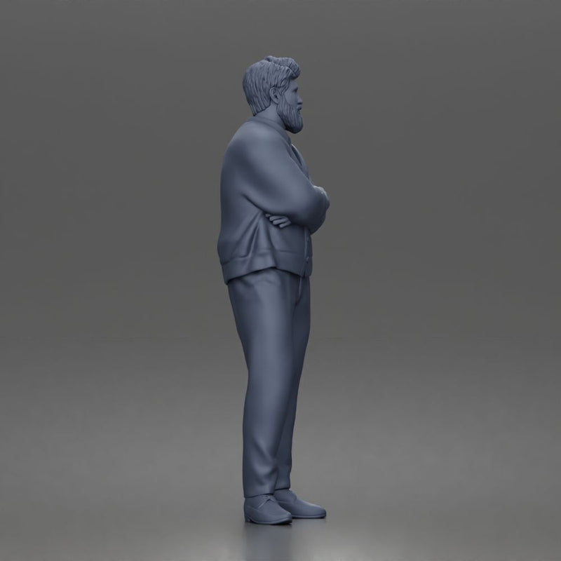 Man Standing Calmly in Casual Cardigan and Dress Pants