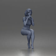 Sitting Woman Clasping Hands Near Chin In Crop Top Bottoms - Only-Games
