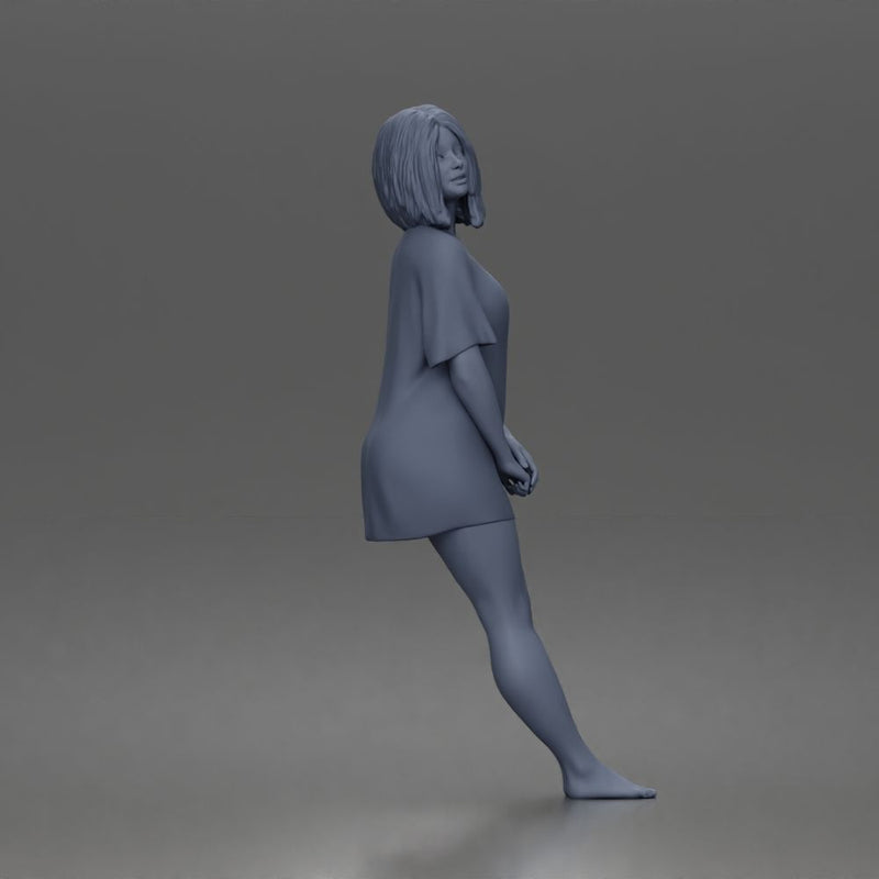 young woman standing barefoot in relaxed oversized t shirt style - Only-Games