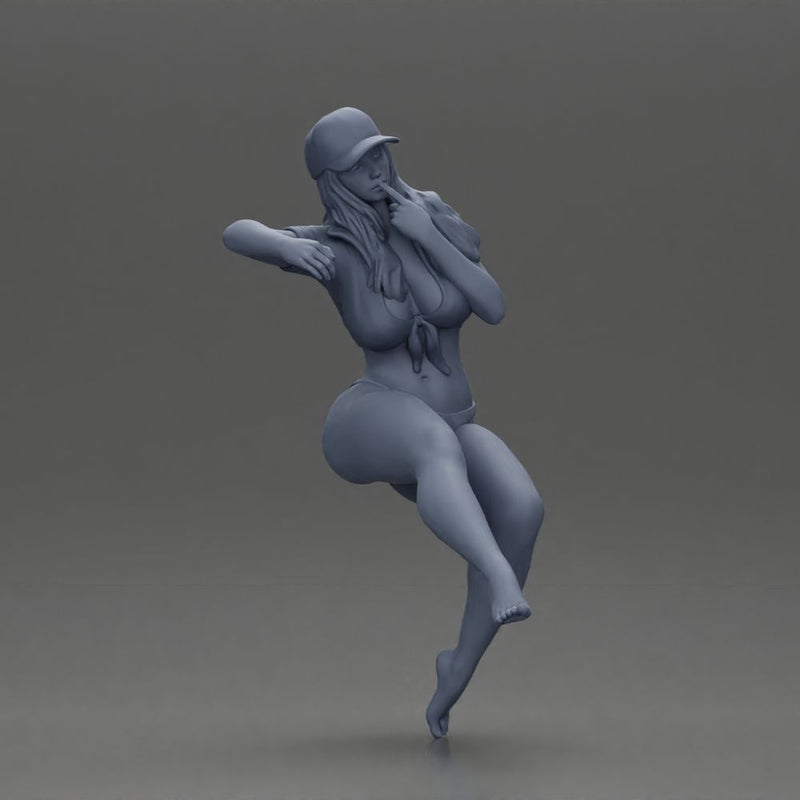 Sexy girl in cap thinking and playfully posing - Only-Games