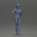 woman posing barefoot wearing bikini top and shorts stylishly - Only-Games