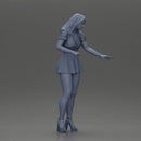 woman standing with a green top white skirt looking like they want to hold something - Only-Games