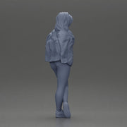 woman standing stylishly hands in pockets striking pose - Only-Games