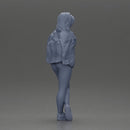 woman standing stylishly hands in pockets striking pose - Only-Games