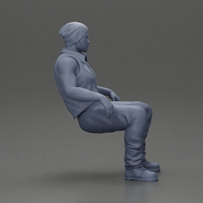 Muscular Bearded Man in Beanie Vest Pants Sitting Casually Relaxed - Only-Games