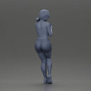 Girl casually checking her phone while striking a relaxed pose - Only-Games