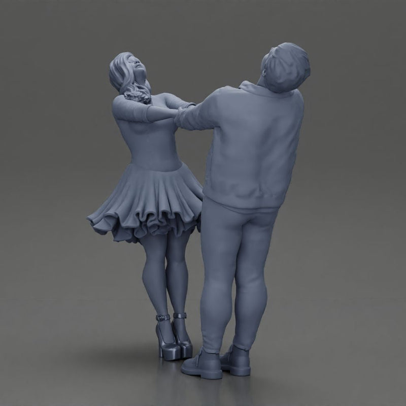 Couple leaning back holding hands enjoying a playful dance moment - Only-Games