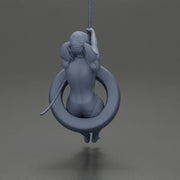 Sexy Girl in onepiece Enjoying a Fun Swinging Adventure on Tire - Only-Games