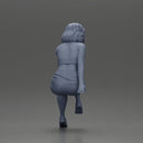 Confident Blonde Woman Sitting Gracefully in Red and Pink - Only-Games