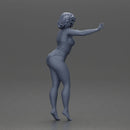 Woman with short black hair wearing pink swimsuit raising arms - Only-Games