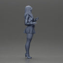 Beautiful girl standing in jacket and dress waiting for someone for a date - Only-Games