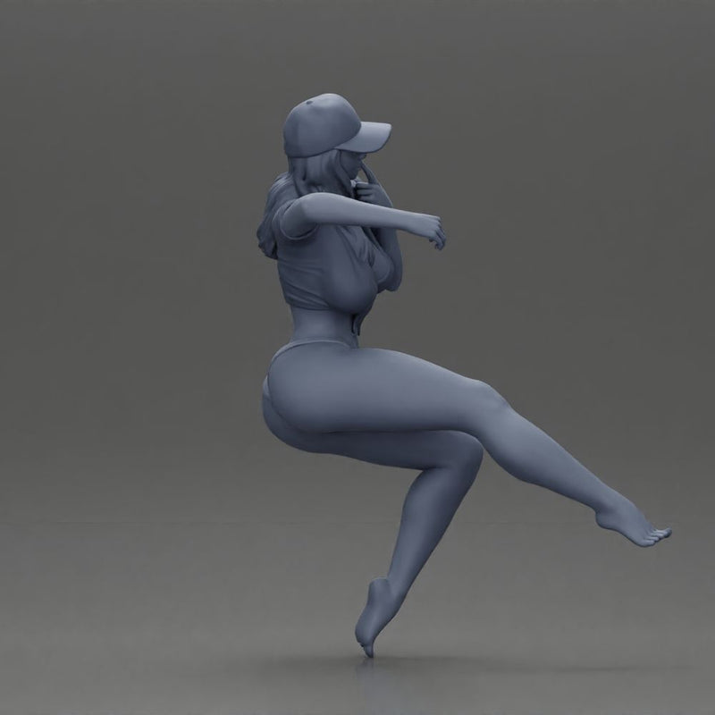 Sexy girl in cap thinking and playfully posing - Only-Games