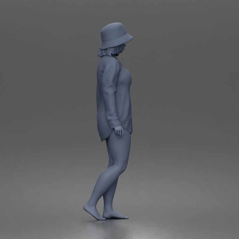 Standing woman In Oversized Button-Shirt With Bucket Hat Barefoot