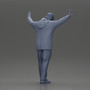 Man wearing hoodie and beanie raises hands looking happy in relaxed stance - Only-Games