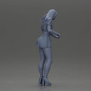 woman standing with a green top white skirt looking like they want to hold something - Only-Games