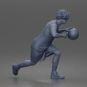 Basketball player drives forward dribbling ball wearing sleeveless jersey shorts socks sneakers - Only-Games