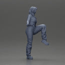 Woman in Headphones Lifting Leg in Stylish Streetwear - Only-Games