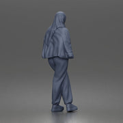 hijabi woman sipping takeaway drink in modern casual streetwear style - Only-Games