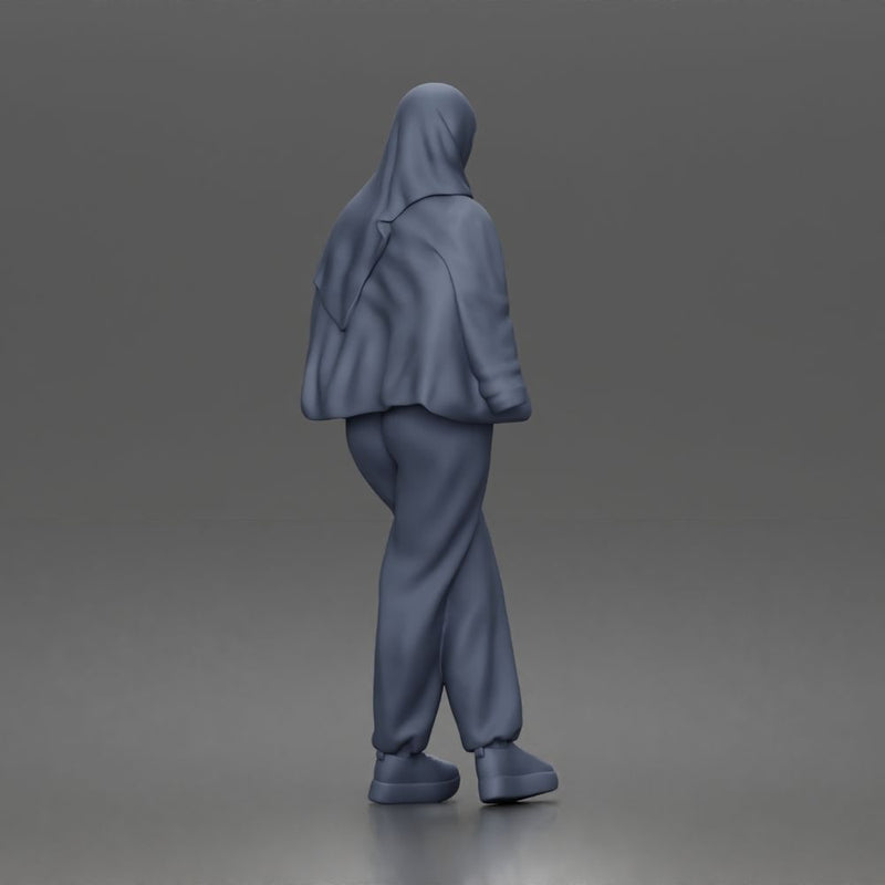hijabi woman sipping takeaway drink in modern casual streetwear style - Only-Games