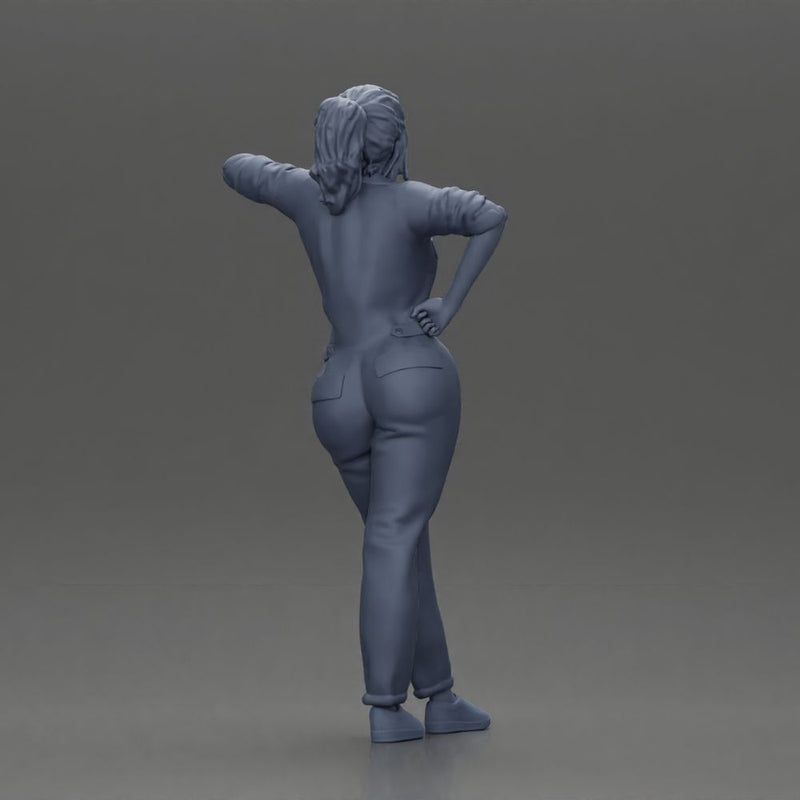 woman in jumpsuit leaning pointing forward ready for action - Only-Games