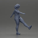 Woman in casual outfit joyfully kicks her leg with energy - Only-Games