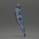 woman in a turquoise swimsuit striking a pose - Only-Games