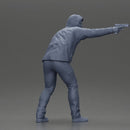 Man in hoodie pointing gun while raising hand in defensive gesture - Only-Games