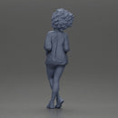 Stylish woman posing confidently with voluminous hair and trendy outfit - Only-Games