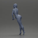 woman in a turquoise swimsuit striking a pose - Only-Games