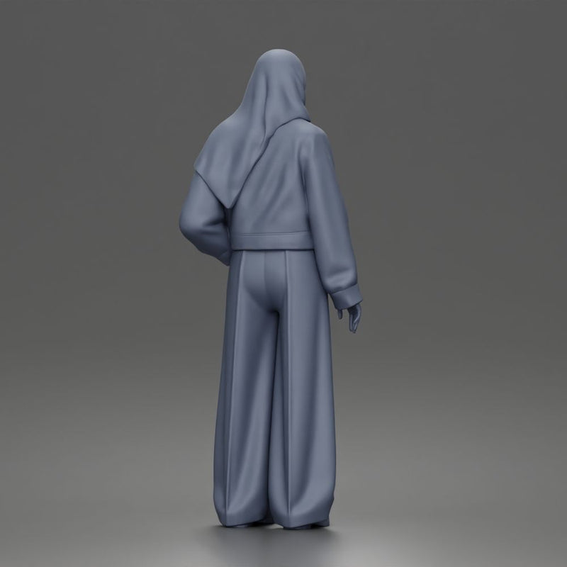 Relaxed Hijab Stander Posing in Jacket Shirt Pants and Sneakers