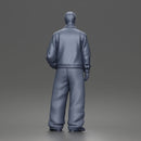 Standing In Leather Jacket Button Shirt Loose Trousers And Shoes