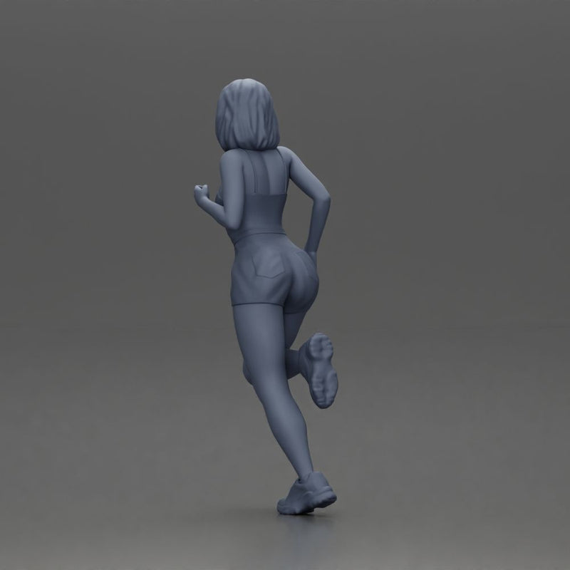 Woman with short hair wearing white top and yellow shorts running - Only-Games