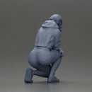 Performer crouching thoughtfully in yellow jacket green shorts white sneakers - Only-Games