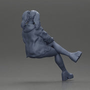 Stylish Woman in Blue Jacket Relaxing with Confident Poise - Only-Games