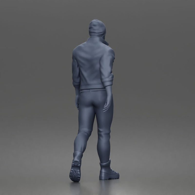 Urban explorer walking confidently in beanie jacket fitted pants and boots - Only-Games