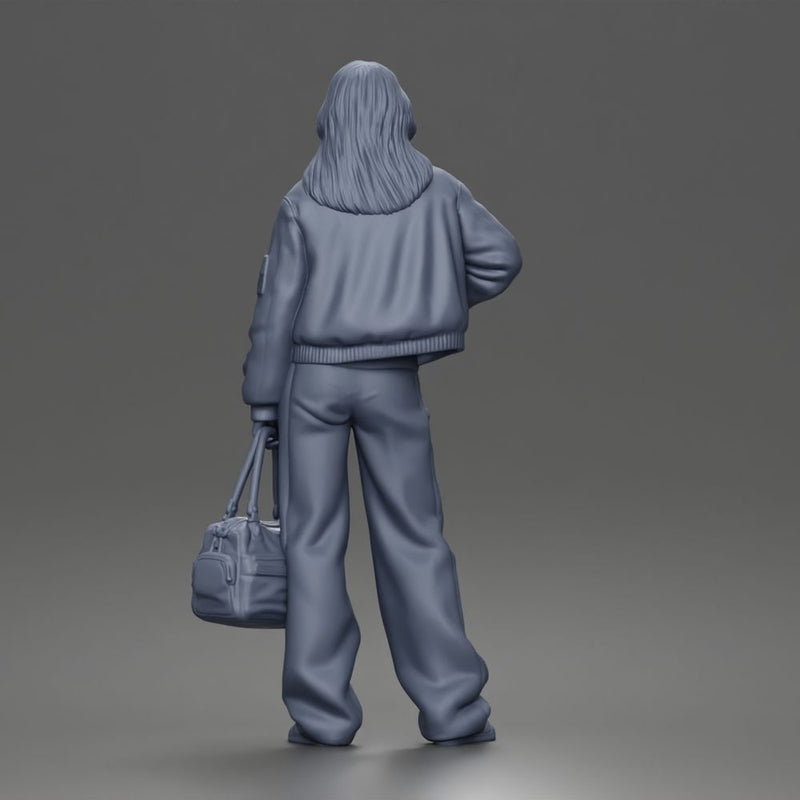 Confident Hand On Hip Poser Holding Bag Jacket Pants Sneakers
