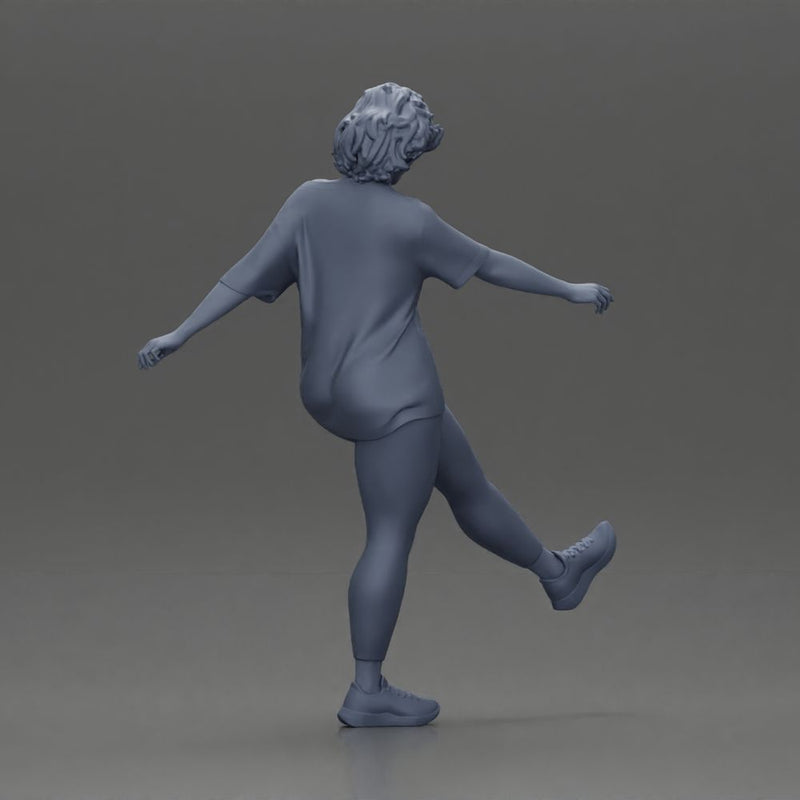 Woman in casual outfit joyfully kicks her leg with energy - Only-Games