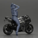 Bold Woman in Pink Jumpsuit Posing on a Sleek Motorcycle - Only-Games